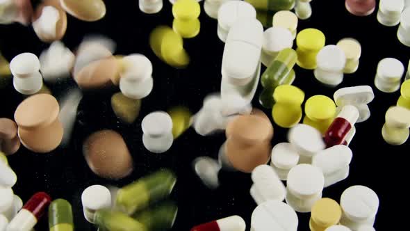 Pills Falling On Mirrored Surface Drugs Medicine