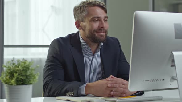Businessman Making Video Call over Web alt