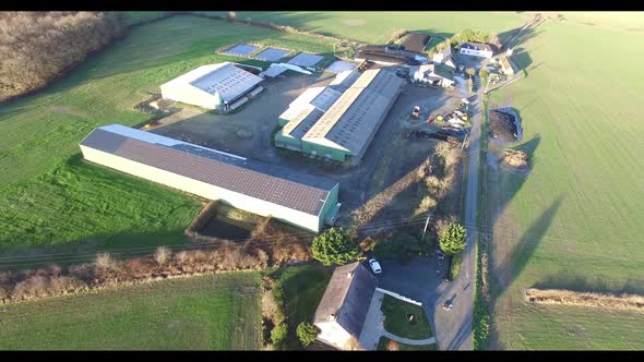 Aerial view of a farm at sunrise.