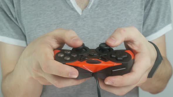 Guy Plays The Game Using A Modern Gamepad