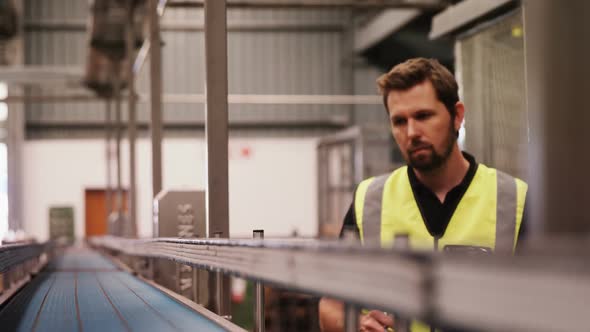 Engineer checking machine alt