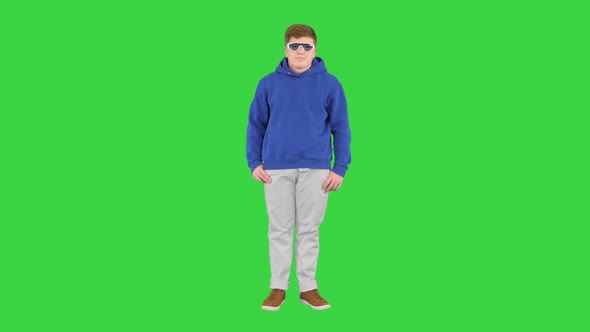 Boy Kid Wearing Casual Clothes and Cool Sunglasses Standing Doing Nothing on a Green Screen Chroma alt