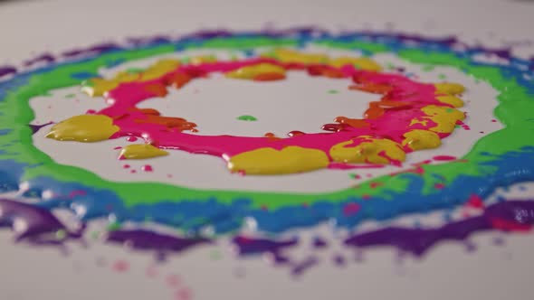 Purple, Blue, Green, Yellow, Pink, Red And Orange Are Spinning. alt