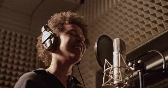 Black Singer Rapping in Studio alt