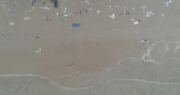 Trash, plastic, garbage, bottle... environmental pollution on the beach