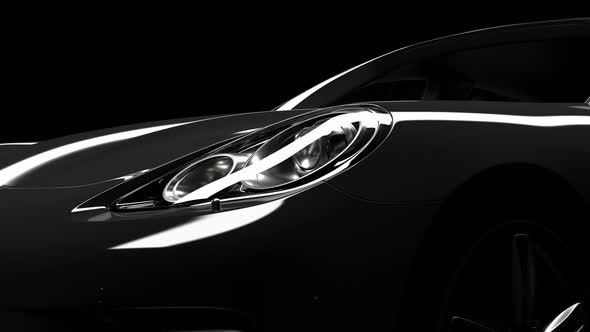 the black car gradually emerges from the darkness due to the illumination alt