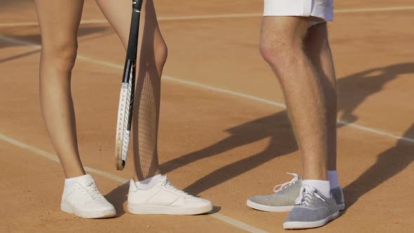 Tennis Players Talking On Court Sports Shoes For Athletes Feet Close Up By Motortion