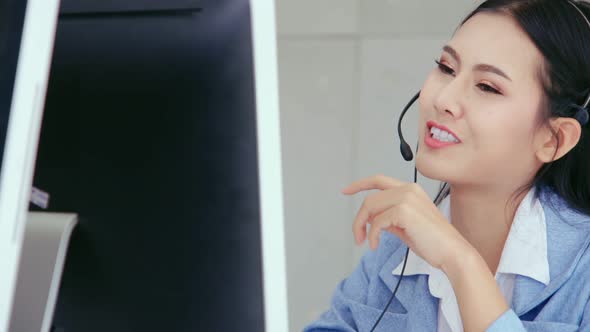 Customer Support Agent or Call Center with Headset Talking to Customer on Phone alt