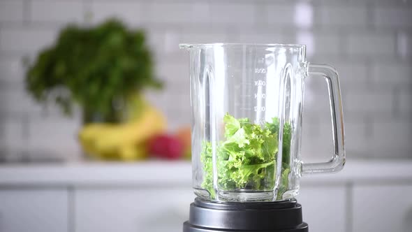 Detox and Healthy Lifestyle Concept. Fruits, Berries and Greens Blended Into Healthy Green Smoothie