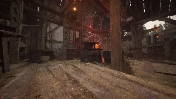 Blacksmiths Tools Hammer and Anvil in Old Blacksmiths Workshop alt