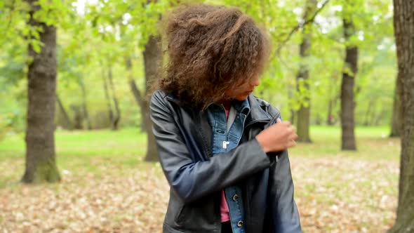 Young Punctual Tidy African Girl Adjust Her Look in the Forest - She Modify Her Clothes alt