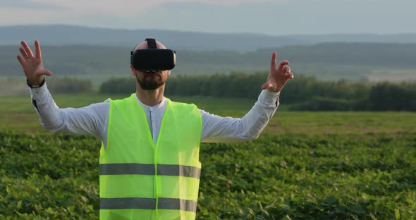 Farm Specialist Engineer Using Technology VR Monitoring Harvest Working for Agriculture Productivity alt