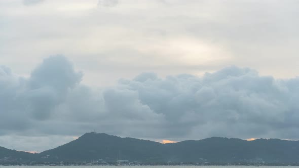 Time Lapse Rain Cloud Over The Phuket Big Buddha In Beautiful Sunset Sky. alt