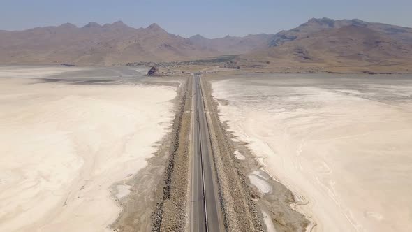 Long Highway on the White Urmia Salt Lake in Iran