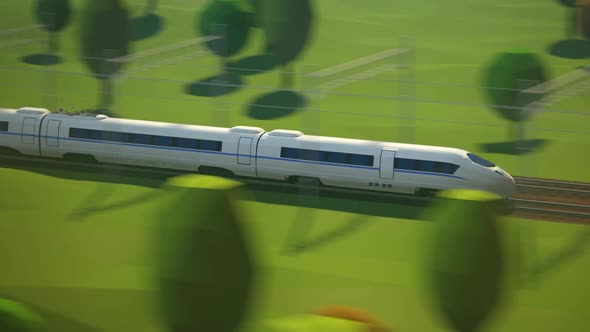The modern high-speed passenger train travels through the countryside. alt