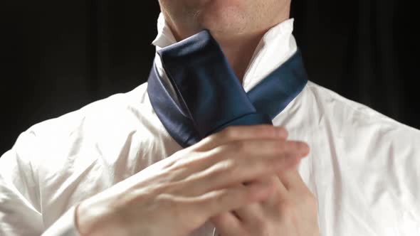 Tie dressing by anonymous businessman studio