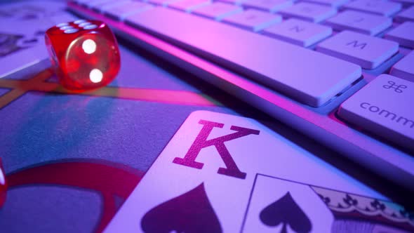 Gaming Table with Computer Keyboard Cards Dice and Casino Chips alt
