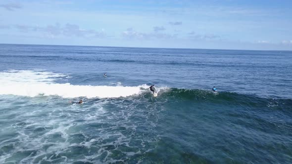 A View From Above of the Surfers in the Ocean