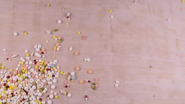 Pills A Lot Of Them Being Spilled On A White Brown Surface
