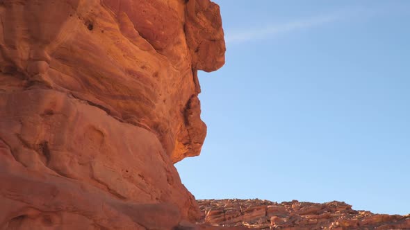 Rocks Coloured Canyon on a Background of Blue Sky