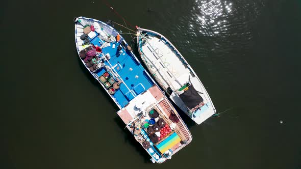 View of Fishing Boats in a Small Bay in the South of the Island of Sri Lanka. Aerial View.