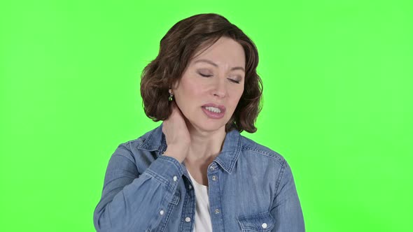 Old Woman with Neck Pain on Green Chroma Key Background  alt