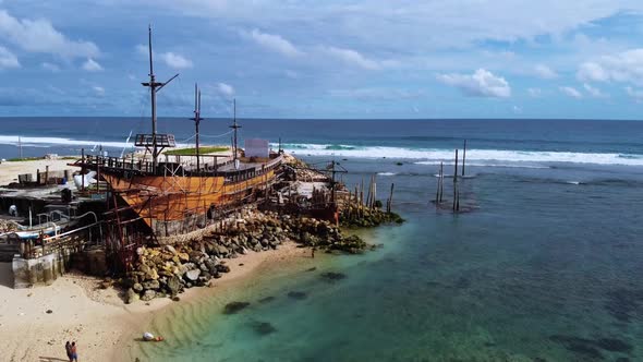 2.7K Bali Abandoned Boat on the Beach Aerial alt