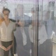 Multiethnic Office Employees Walking Out of Glass Elevator - VideoHive Item for Sale