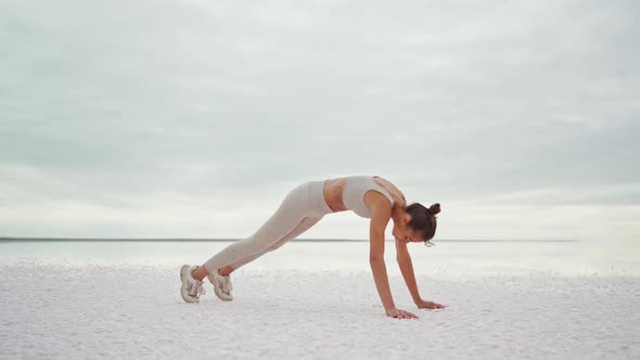 Slender Mixed Race Woman Practices Yoga Outdoors in Nature alt