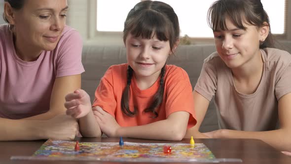 Children and Adult with Board Game alt