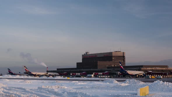 Timelapse of planes and vehicles traffic at Terminal F in Sheremetyevo Airport alt