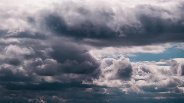 Timelapse of Gray Cumulus Clouds Moves in Blue Dramatic Sky Cirrus Cloud Space alt