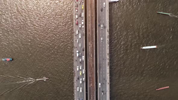 4k Time lapse, Top view of the Chao Phraya River, Traffic of cars and boats. alt