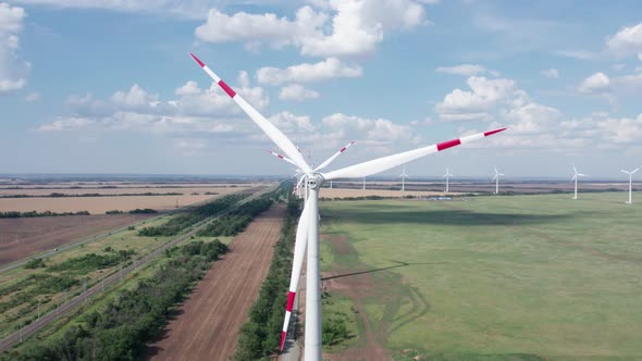 Aerial View of Wind Power Turbine is a Popular Sustainable Renewable Energy Source on Beautiful alt
