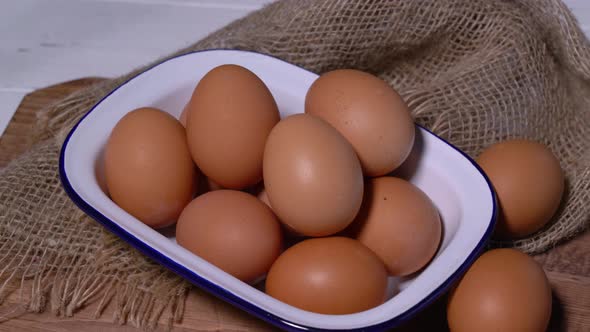 Chicken eggs on bowl