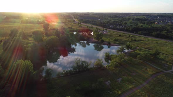 Sunset over reflecting water in 4K. alt
