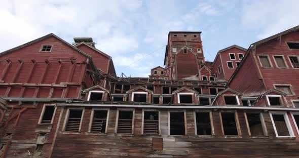 Abandoned Wooden Buildings in Old Kennicott Copper Mills Settlement, Alaska USA. Deserted From 1930s alt