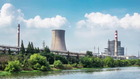 Time lapse of Steel mills and cooling towers,factory smoke stack alt