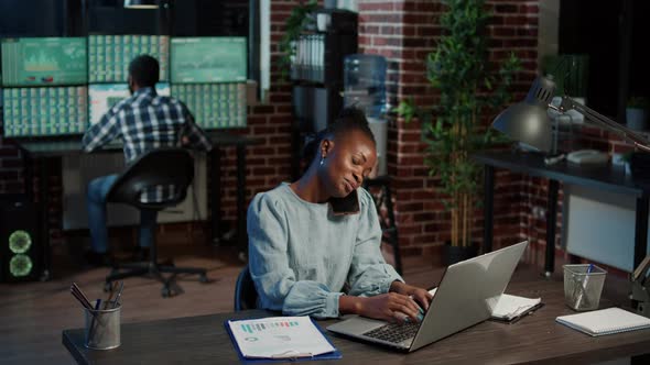 Sales Consultant Talking on Phone Call About Business Investment alt