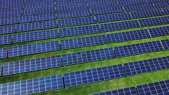 Large Field Of Blue Photovoltaic Solar Panels. Aerial View alt