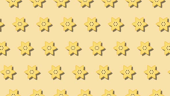 Star fruit Carambola in animated pattern on a yellow background. Seamless loop food animation alt