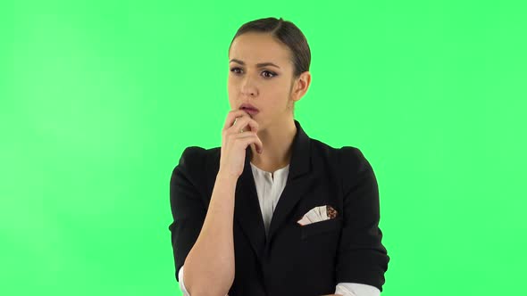 Young Girl Thinks About Something, and Then an Idea Comes To Her. Green Screen alt