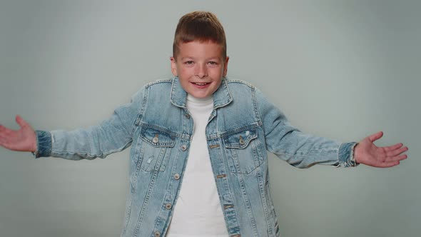 Boy Raising Hands in Indignant Expression Asking Why What Reason of Failure Demonstrating Disbelief alt