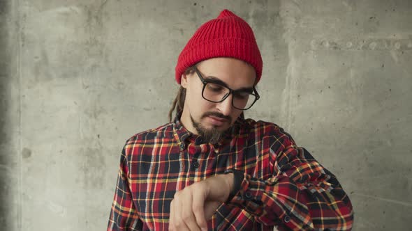 Attractive Man Using His Smartwatch and Controlling His Smart Home Hipster Freelancer Use Smart alt