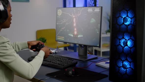 Game Over for Woman African Streamer Playing Space Shooter Video Games alt