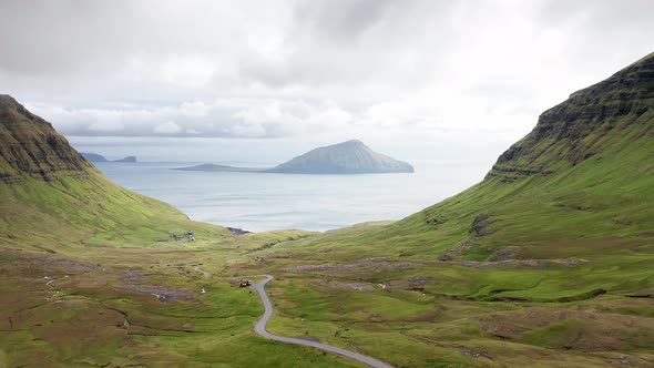 Aerial View of Wilderness Natureislands Ocean Green Mountain and Rock Cliffs alt