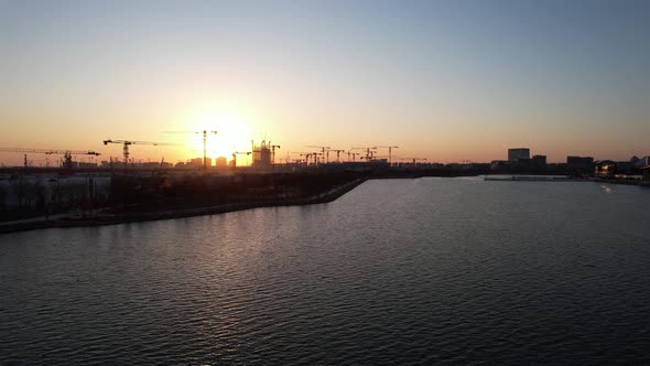 Silhouette of a crane at dusk alt
