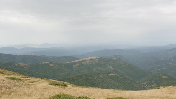 Tilting over valley under Midzor peak 4K 2160p 30fps UltraHD footage - Mountain ranges of Stara plan alt
