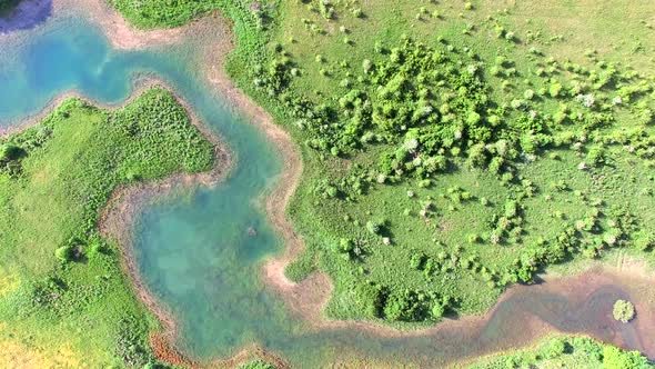 Aerial view of Jesenica river and surrounding in Croatian region Lika. alt
