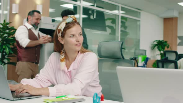 In a Large Aesthetic Office a Handsome Black Man alt